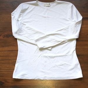 Linda Leal stretching crew neck top